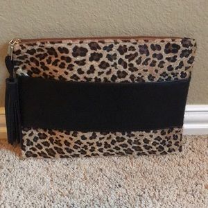 Oversized leopard clutch with leather handle